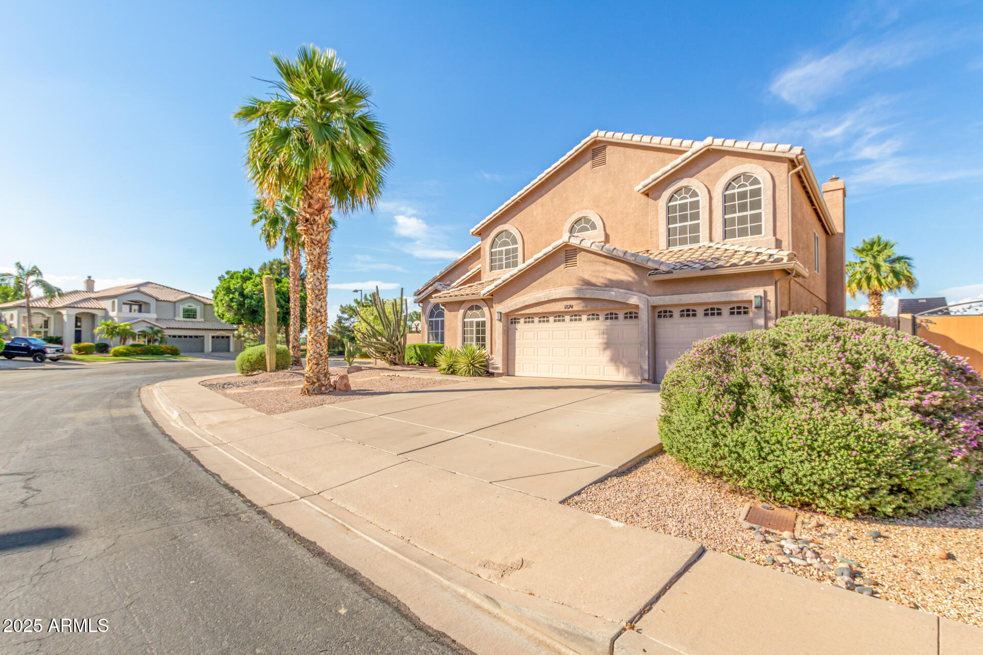 1874 West San Angelo Street Gilbert, AZ 85233 - Photo 3 of 55 a front view of a house with a yard