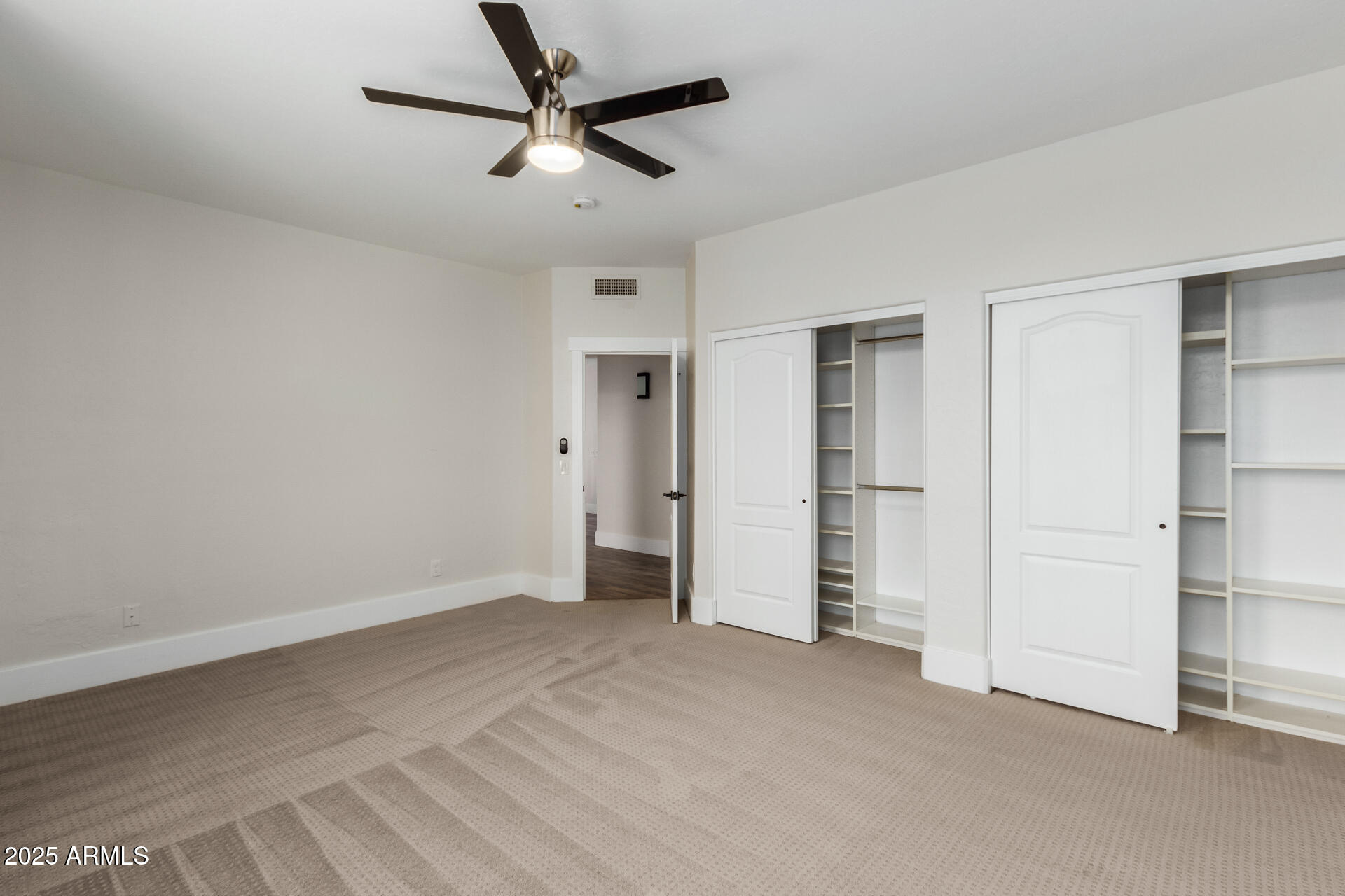 1874 West San Angelo Street Gilbert, AZ 85233 - Photo 37 of 55 a view of empty room with ceiling fan