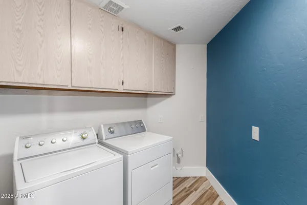 a view of a pathway with a garden