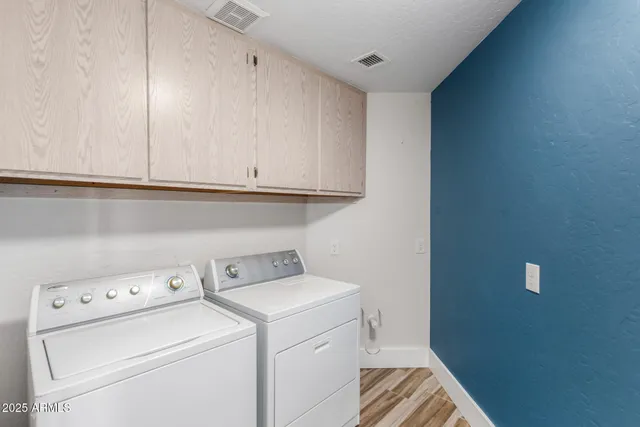 a view of a pathway with a garden