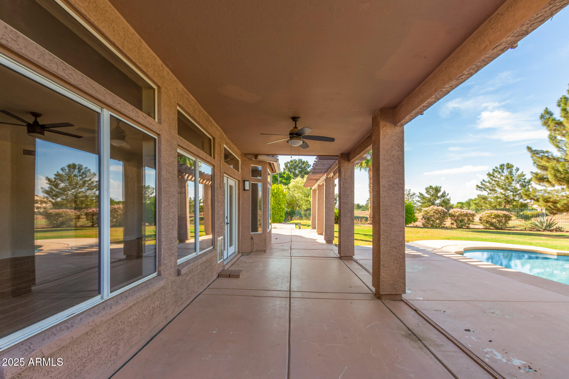 1874 West San Angelo Street Gilbert, AZ 85233 - Photo 47 of 55 a view of a glass door with a large window