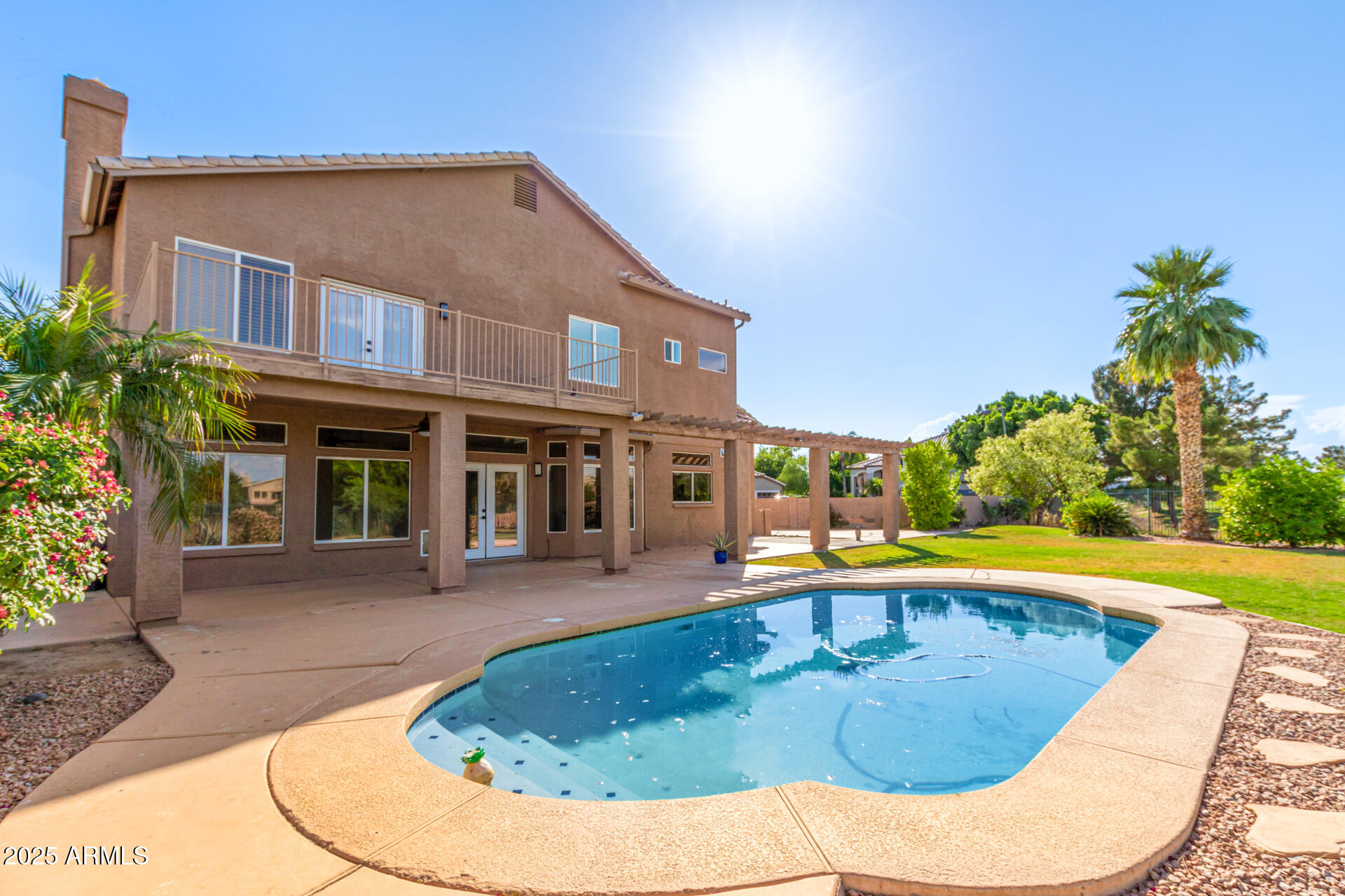 1874 West San Angelo Street Gilbert, AZ 85233 - Photo 49 of 55 a view of a house with swimming pool