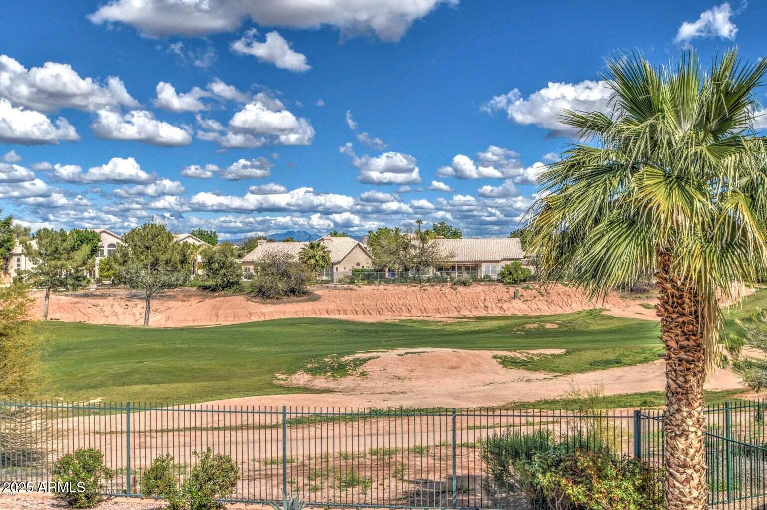 1874 West San Angelo Street Gilbert, AZ 85233 - Photo 54 of 55 a view of a lake with a big yard