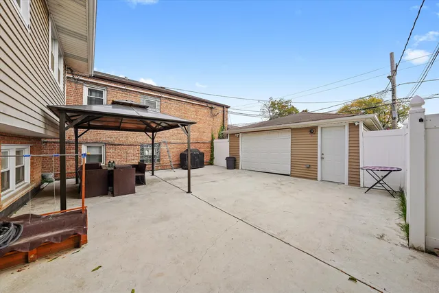 a view of a building with sitting area
