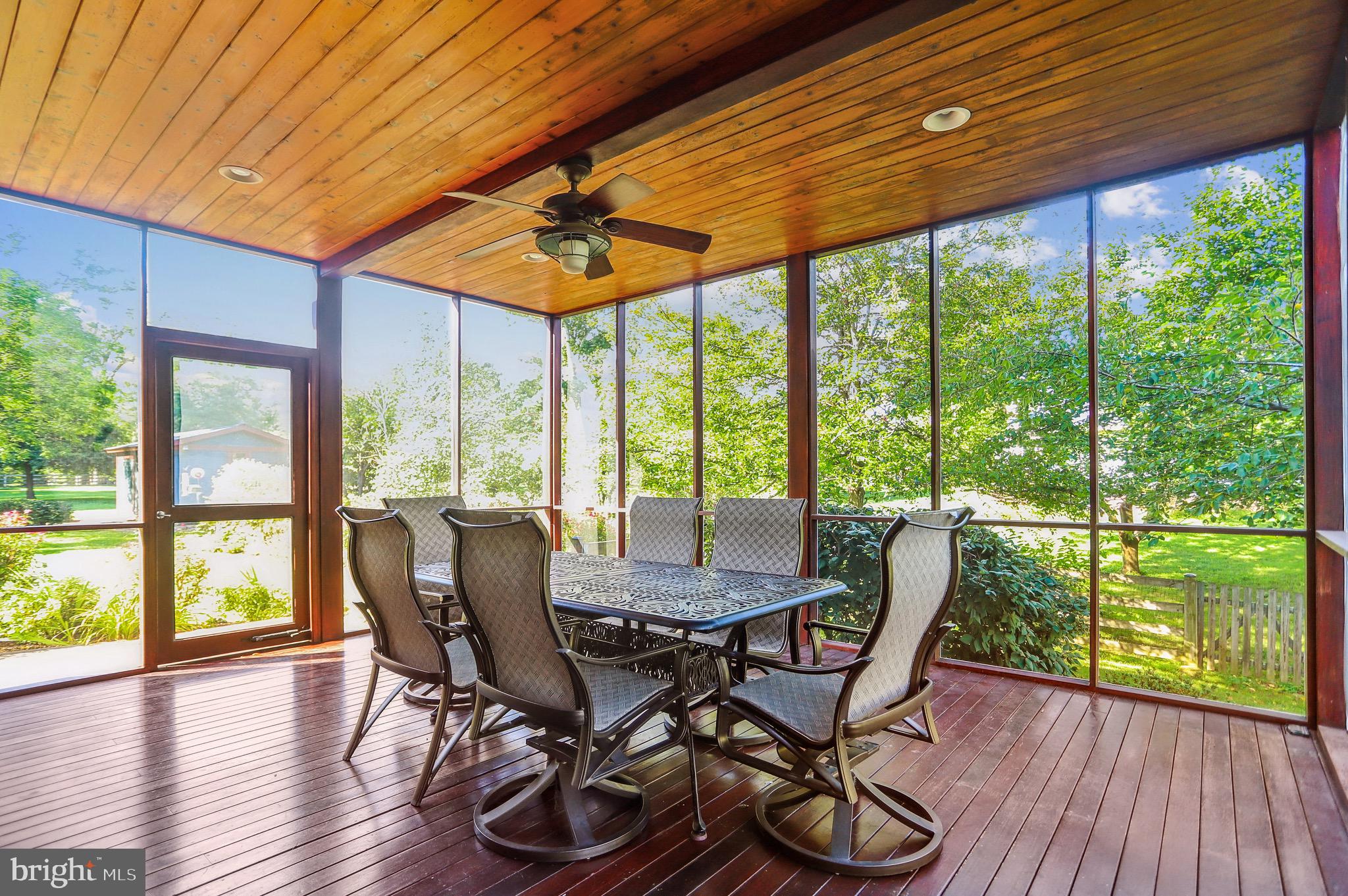 4168 Cadle Creek Road Edgewater, MD 21037 - Photo 20 of 80 Huge screened in porch off kitchen .