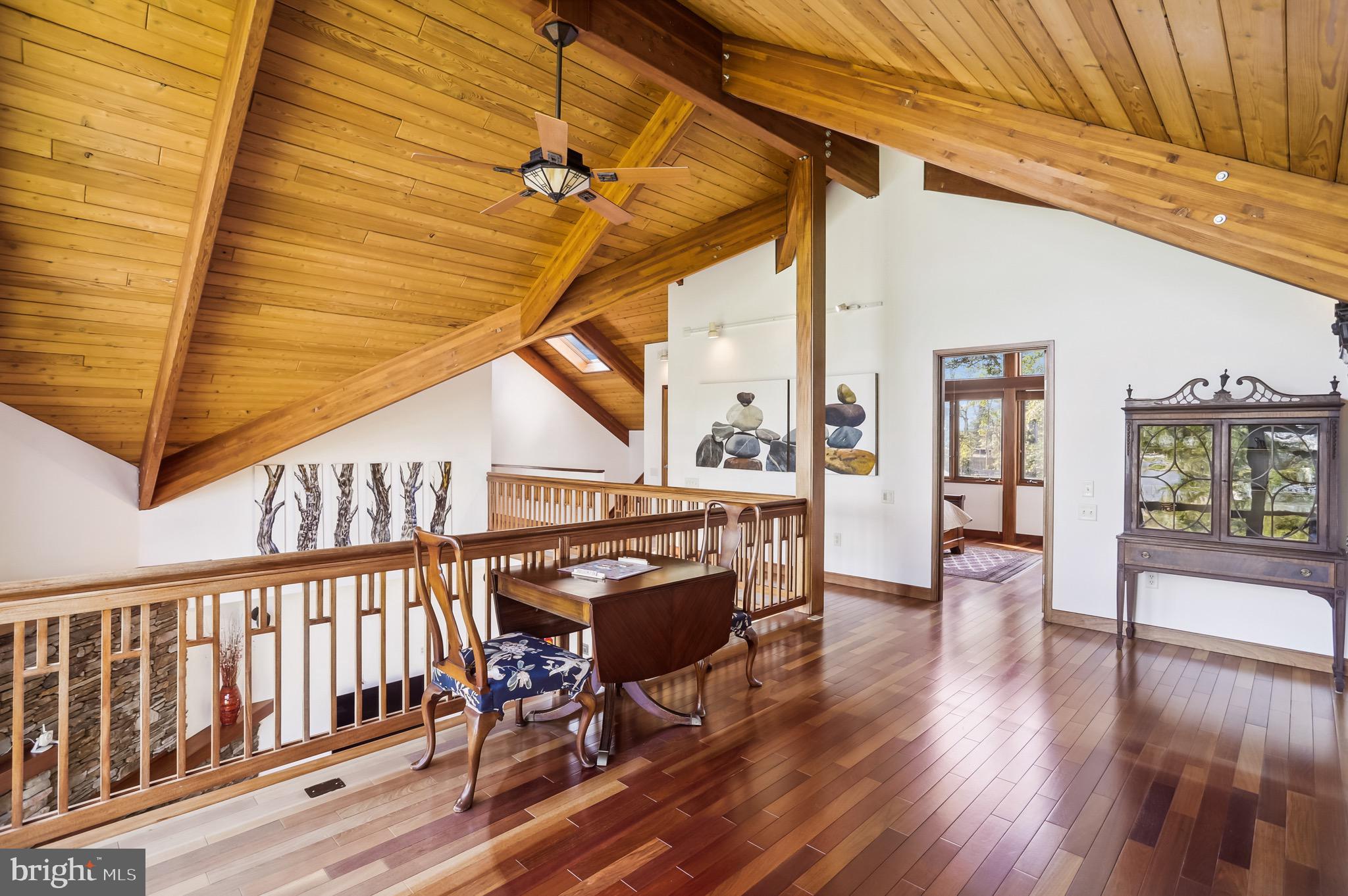 4168 Cadle Creek Road Edgewater, MD 21037 - Photo 34 of 80 Mission style ceiling fan and mahogany railings.