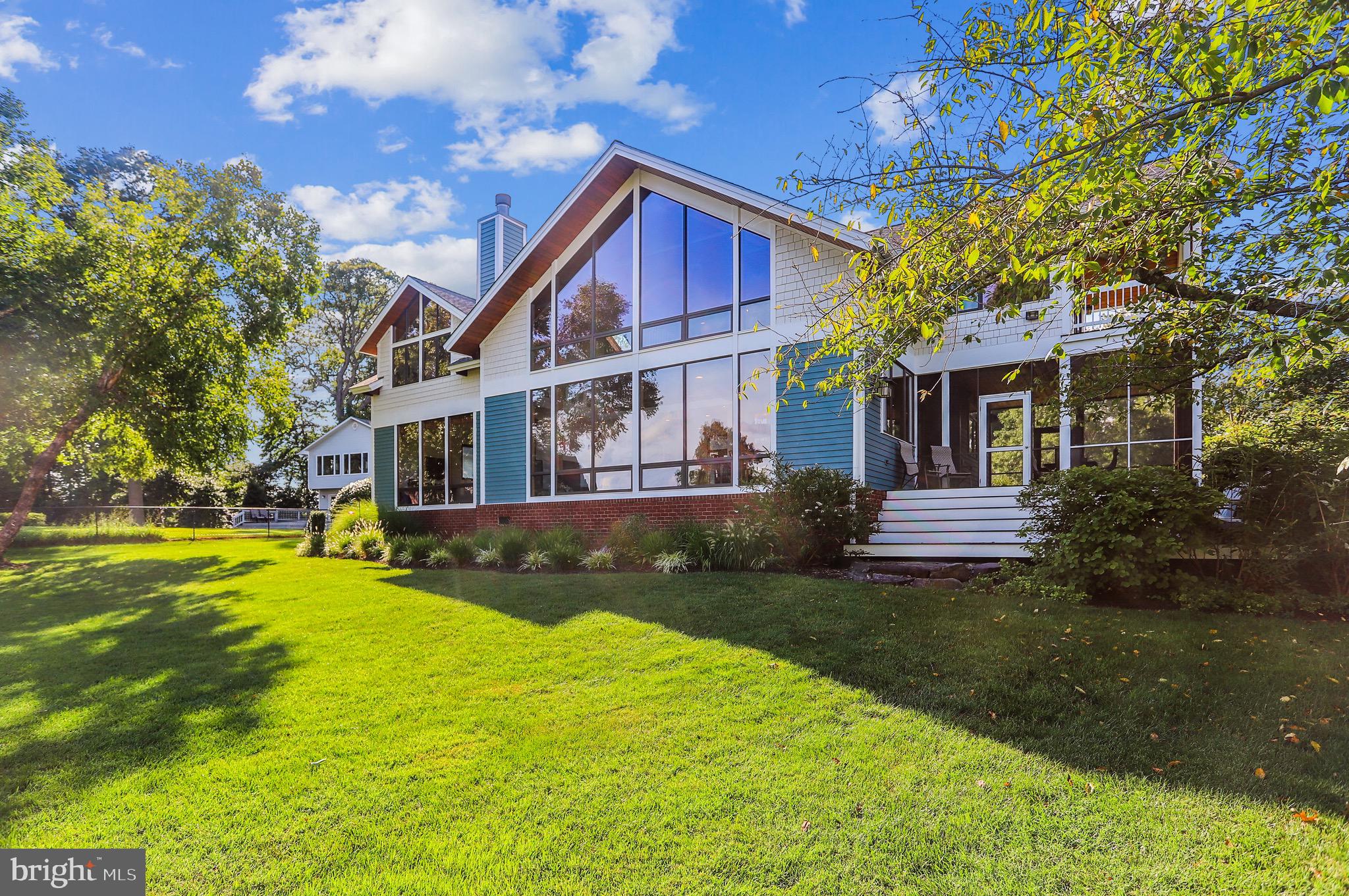 4168 Cadle Creek Road Edgewater, MD 21037 - Photo 59 of 80 Windows practically across the entire rear of home