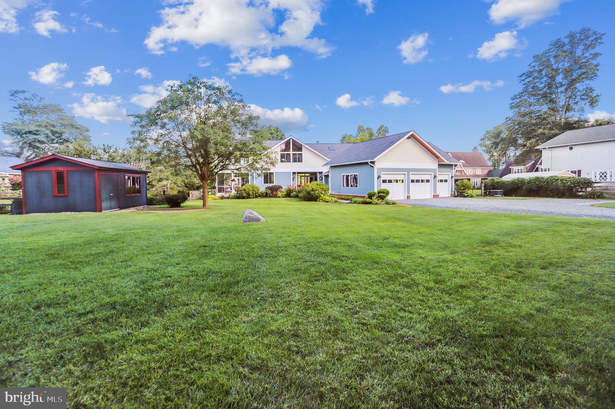 4168 Cadle Creek Road Edgewater, MD 21037 - Photo 69 of 80 Oversized outbuilding/shed for lawn equipment.