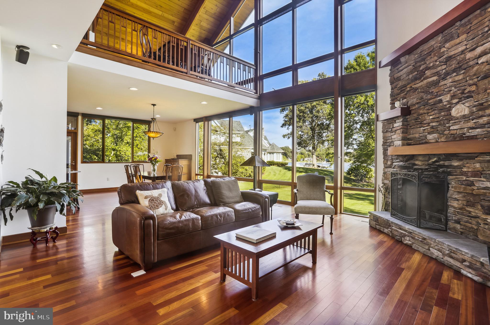 4168 Cadle Creek Road Edgewater, MD 21037 - Photo 9 of 80 Two- story living room with views of Cadle Creek.