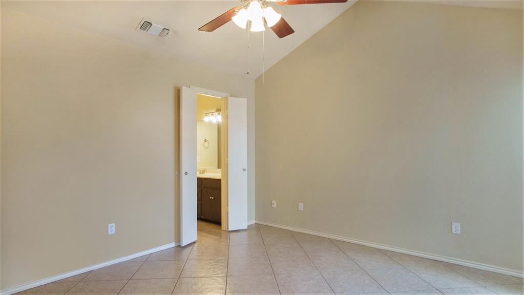 7600 Silveridge Drive Fort Worth, TX 76133 - Photo 14 of 24 a view of an empty room with a window