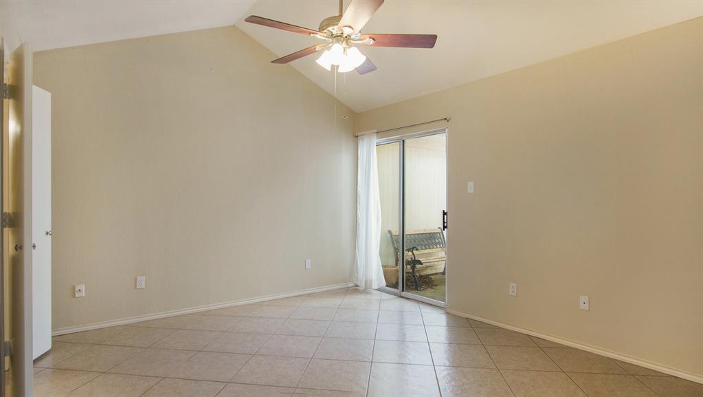 7600 Silveridge Drive Fort Worth, TX 76133 - Photo 15 of 24 a view of an empty room and chandelier fan