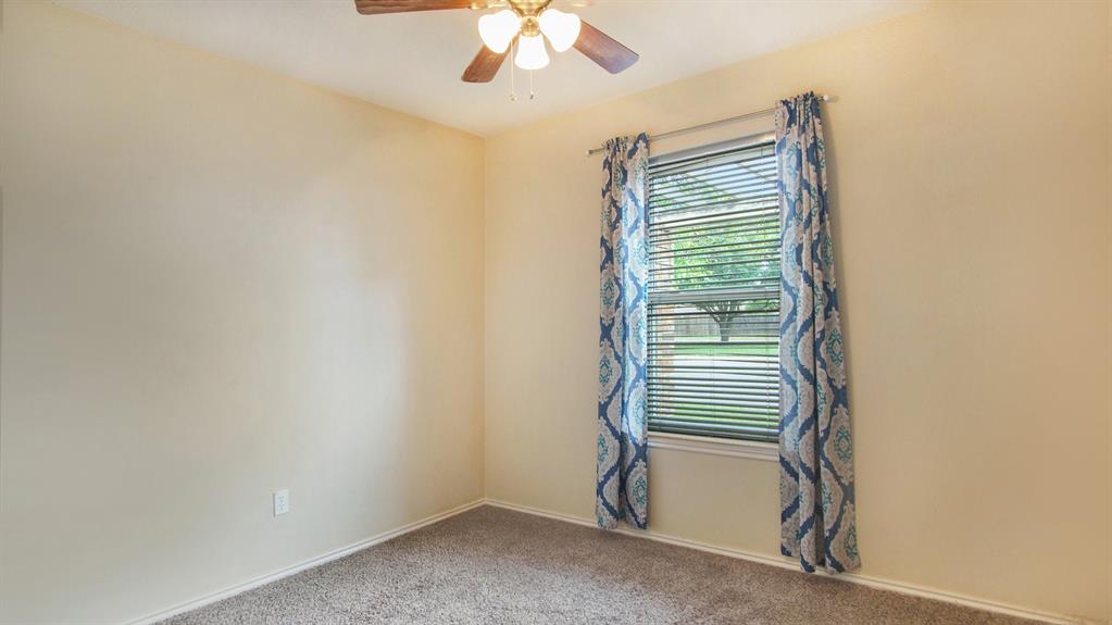 7600 Silveridge Drive Fort Worth, TX 76133 - Photo 18 of 24 an empty room with a window