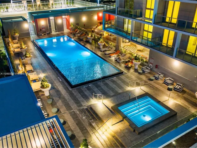 a front view of a building with glass windows