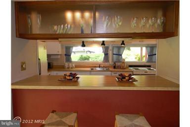 6701 Queens Ferry Road Baltimore, MD 21239 - Photo 15 of 30 Kitchen with Breakfast Bar