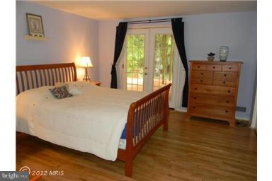 6701 Queens Ferry Road Baltimore, MD 21239 - Photo 4 of 30 with French Doors to lower level Deck