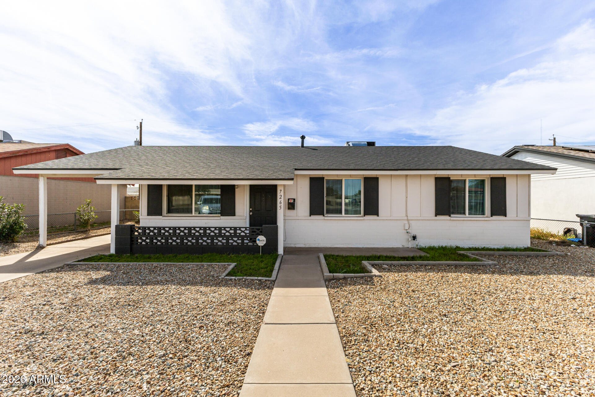 7265 West Camelback Road Phoenix, AZ 85033 - Photo 1 of 31 front view of a house with a yard