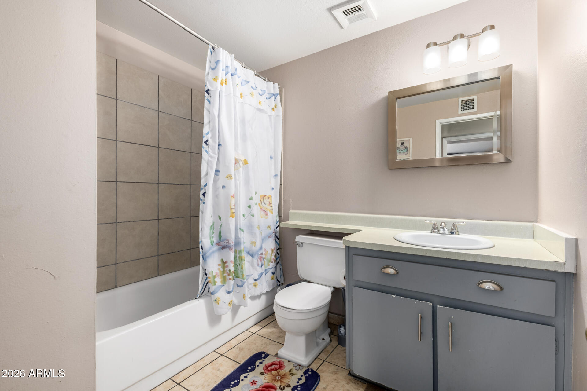 7265 West Camelback Road Phoenix, AZ 85033 - Photo 25 of 31 a bathroom with a sink toilet and shower