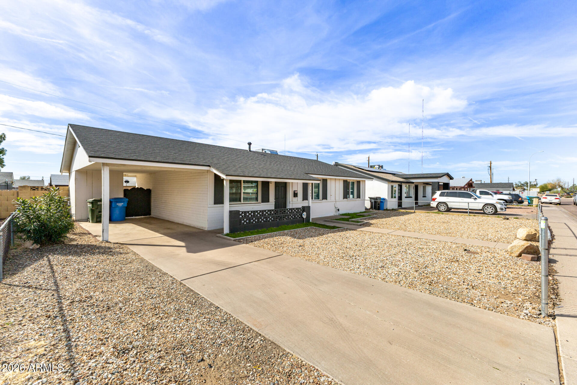 7265 West Camelback Road Phoenix, AZ 85033 - Photo 6 of 31 a front view of a house with a yard