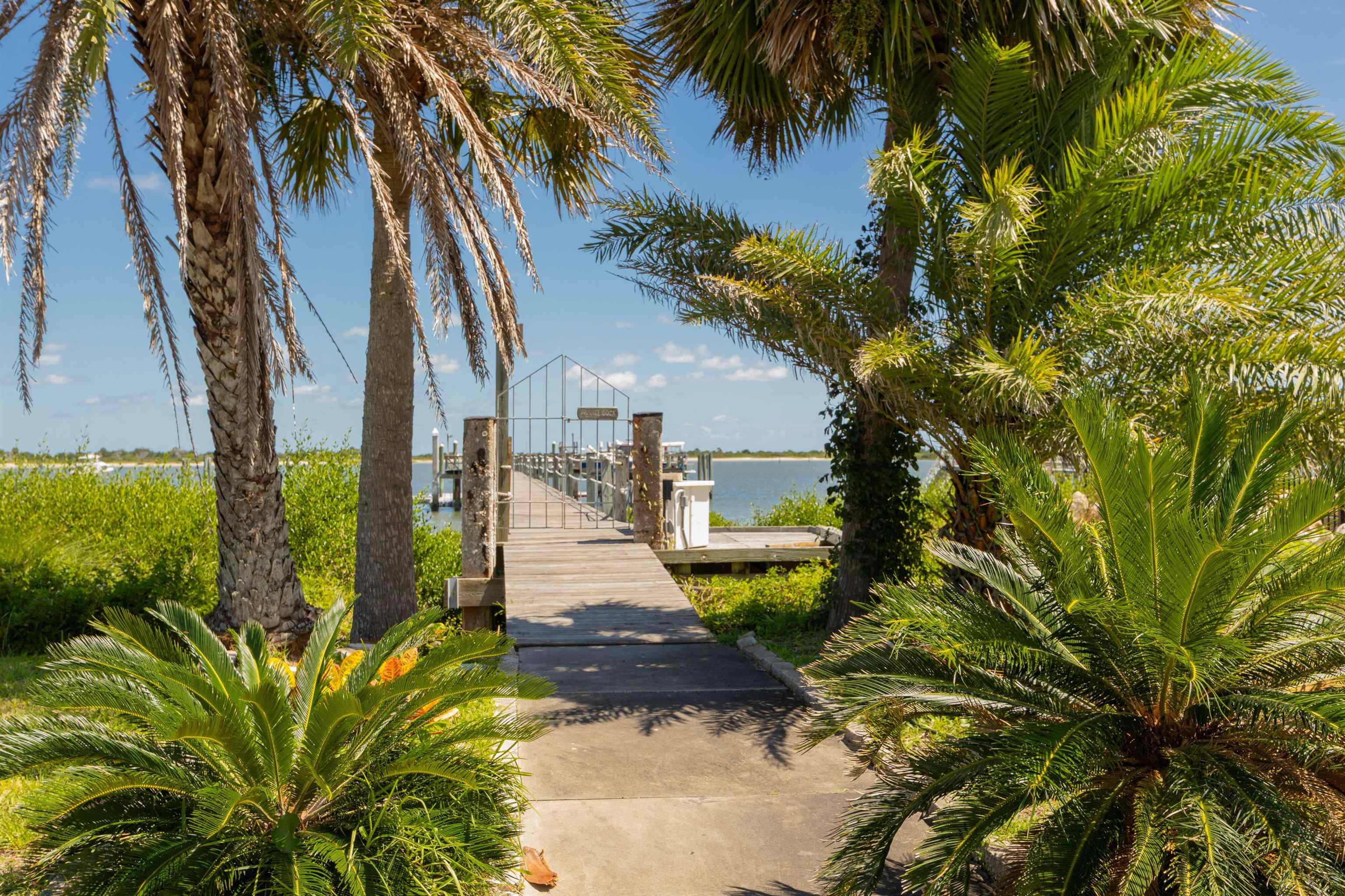 124 Inlet Drive St. Augustine, FL 32080 - Photo 11 of 45 View of home's community featuring a water view and a dock