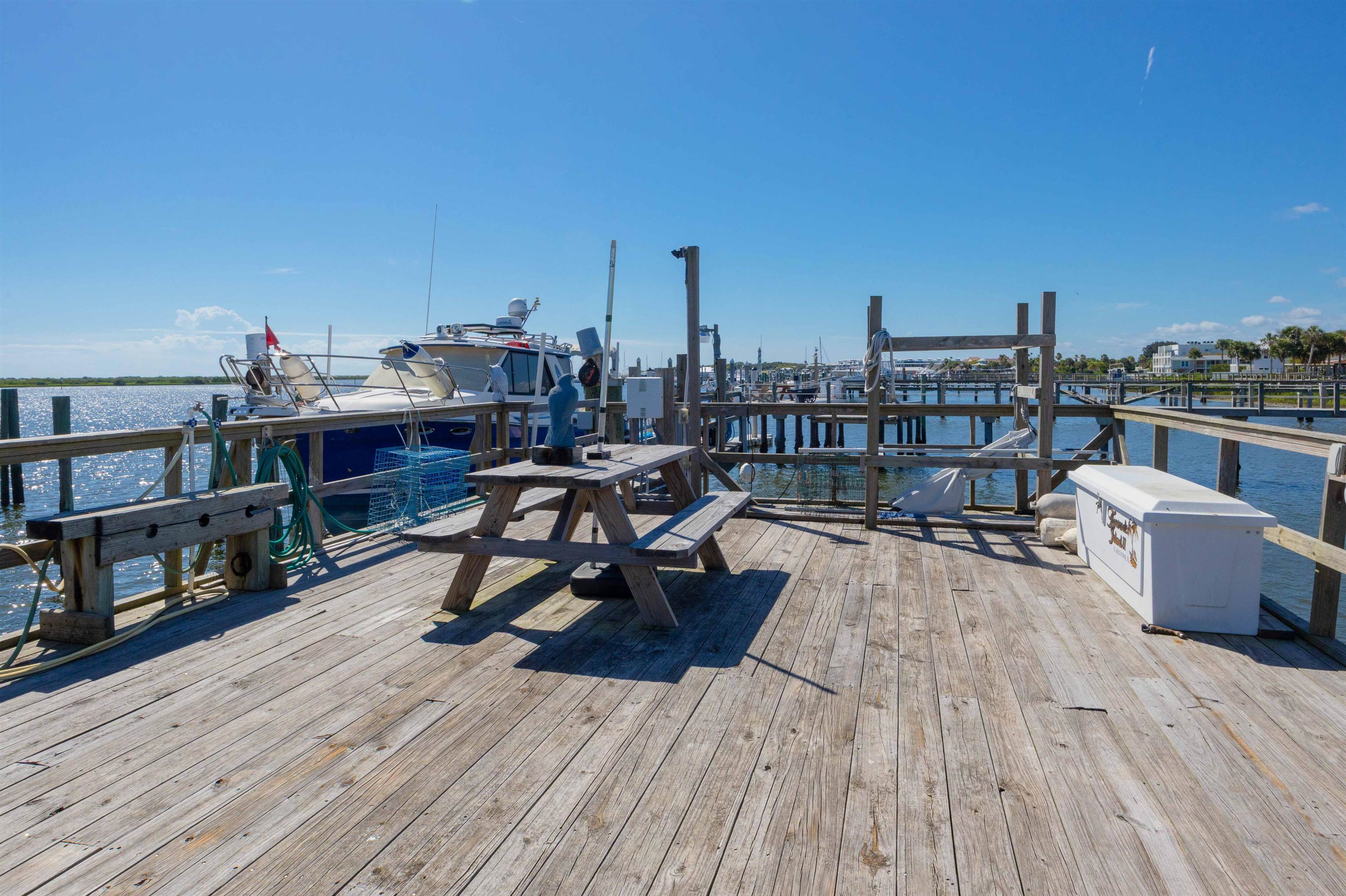 124 Inlet Drive St. Augustine, FL 32080 - Photo 15 of 45 Dock with a water view and boat lift