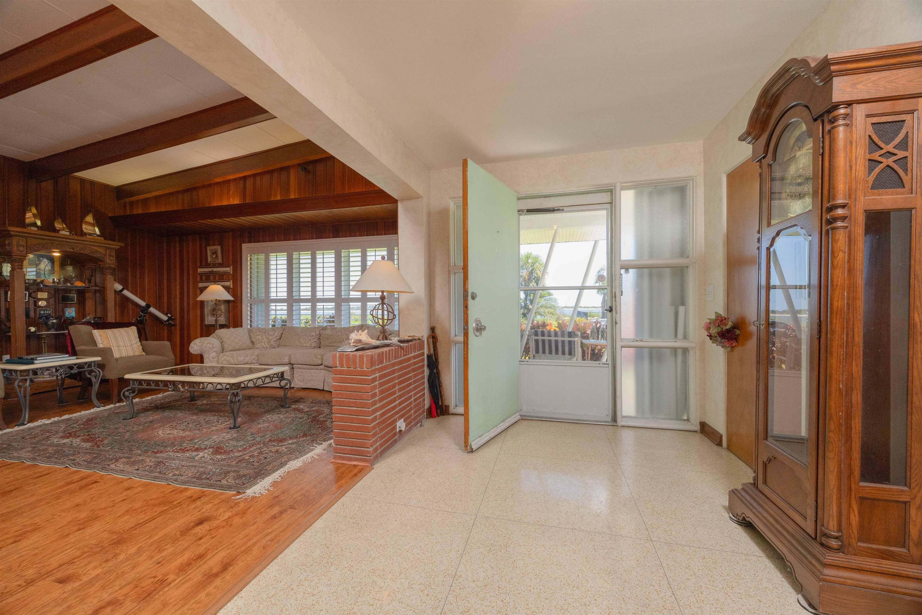 124 Inlet Drive St. Augustine, FL 32080 - Photo 25 of 45 a view of a living room and entry way to room