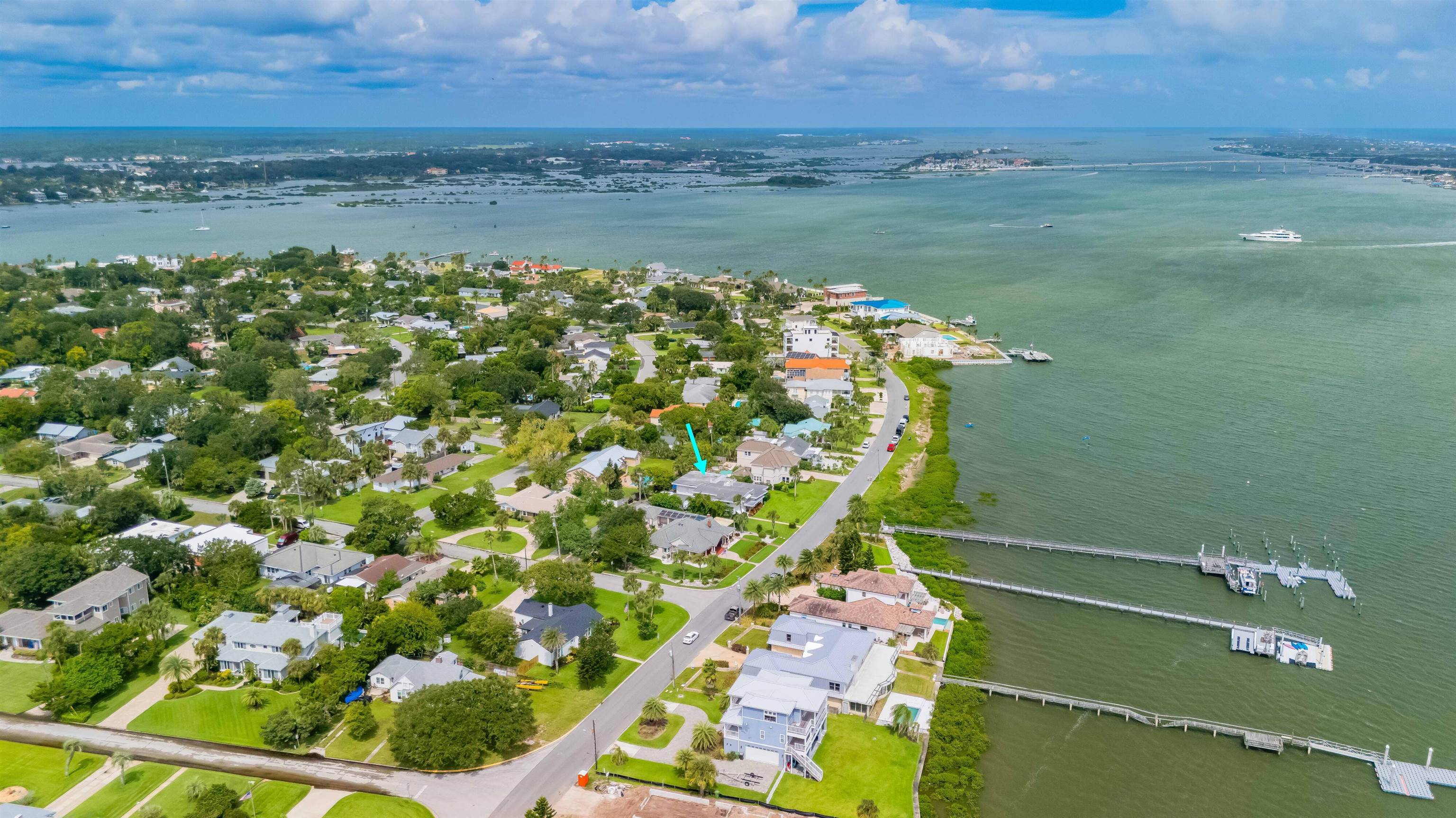 124 Inlet Drive St. Augustine, FL 32080 - Photo 3 of 45 Aerial view of property's location featuring a large body of water and nearby suburban area