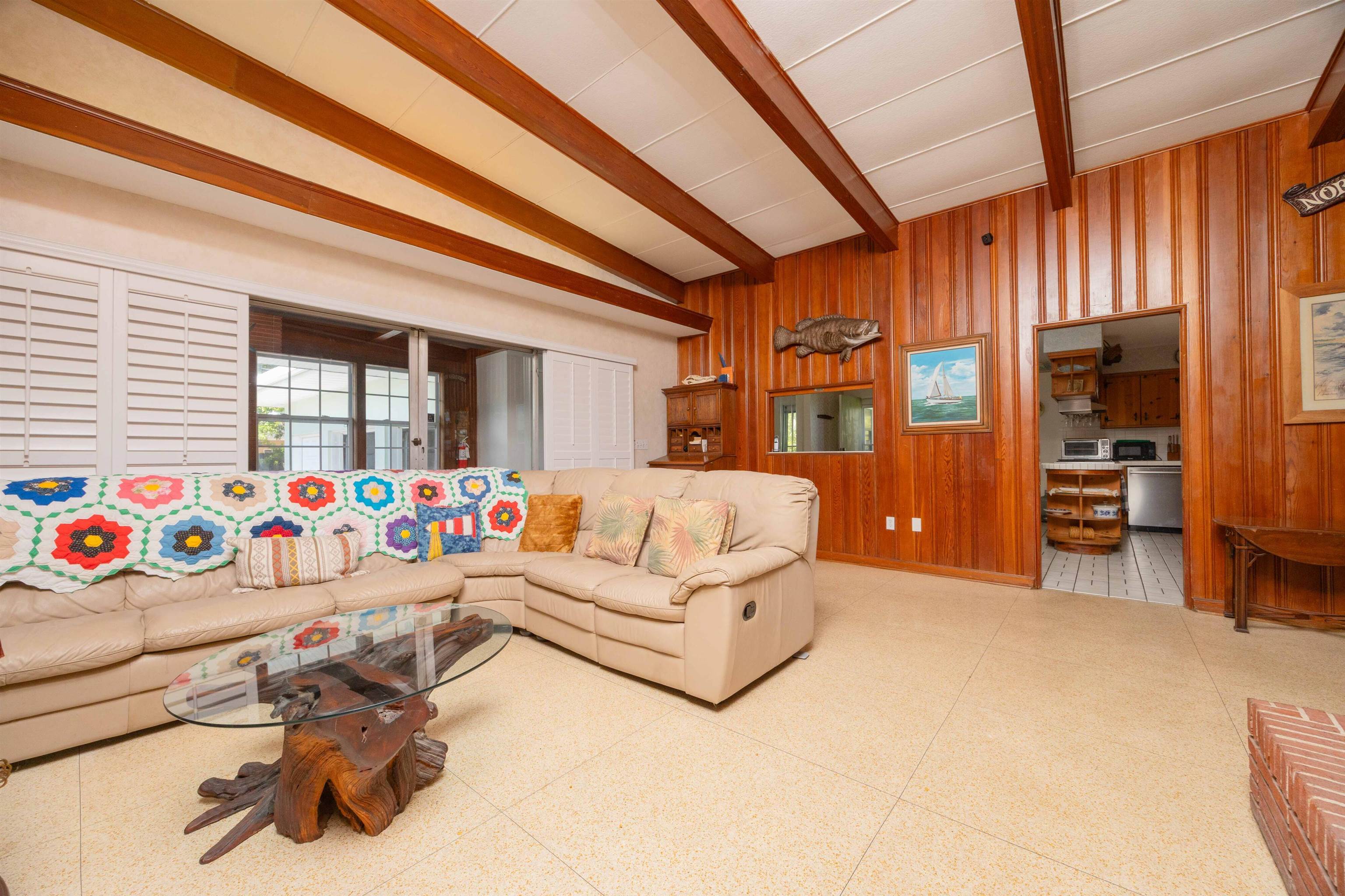 124 Inlet Drive St. Augustine, FL 32080 - Photo 32 of 45 a bedroom with furniture and a book shelf