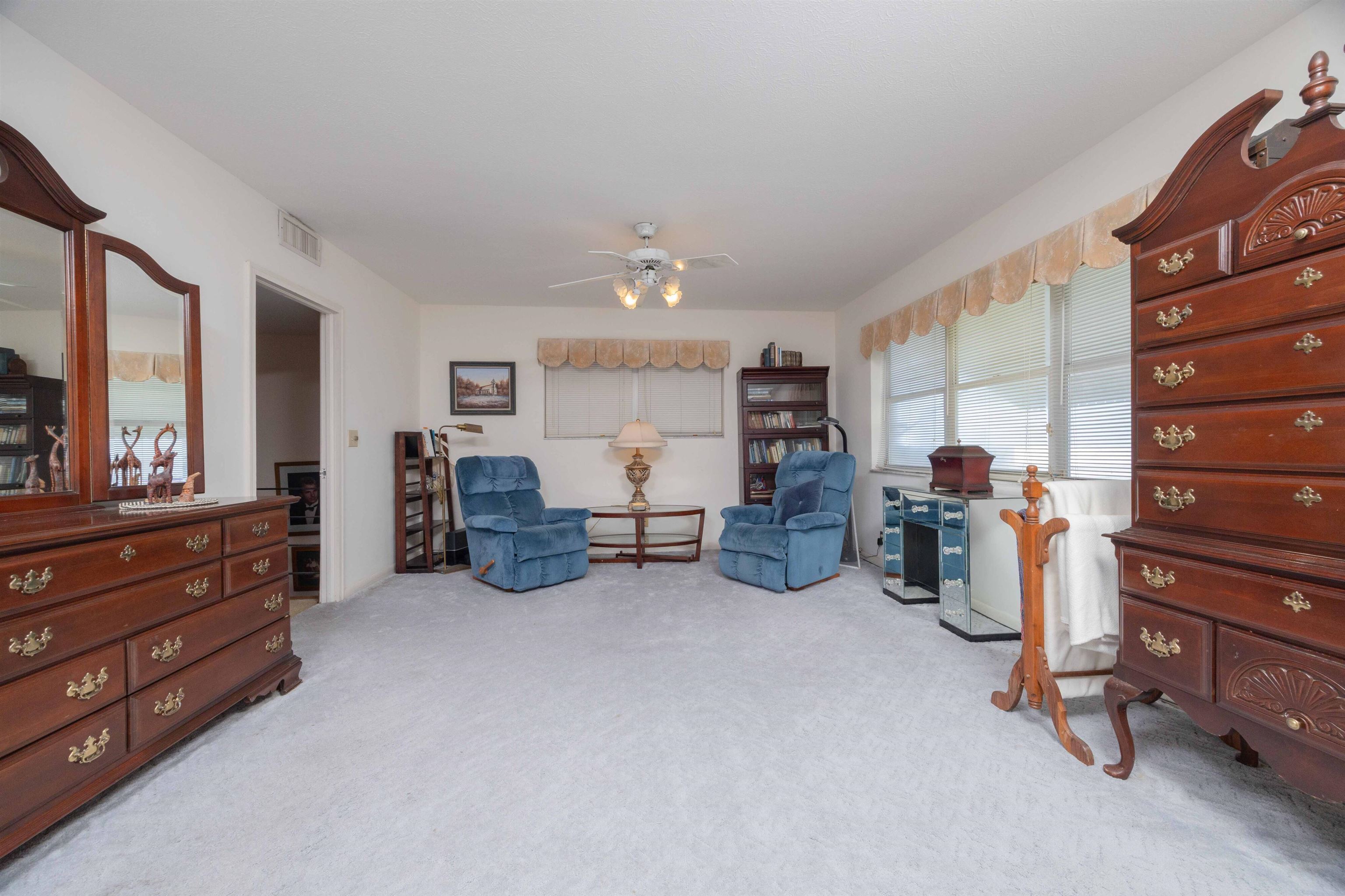 124 Inlet Drive St. Augustine, FL 32080 - Photo 40 of 45 a room with furniture and a dresser