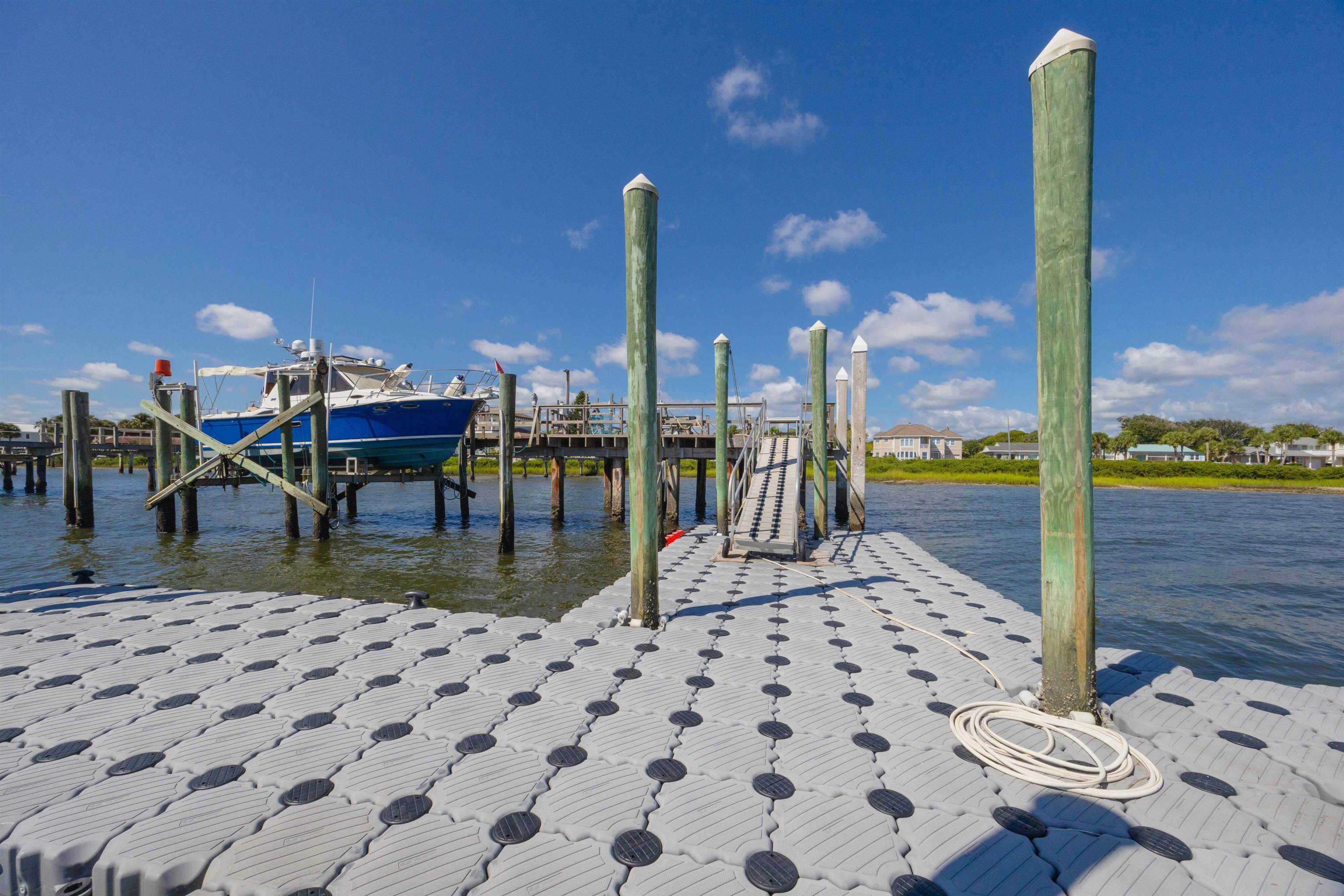 124 Inlet Drive St. Augustine, FL 32080 - Photo 6 of 45 Dock with a water view and boat lift