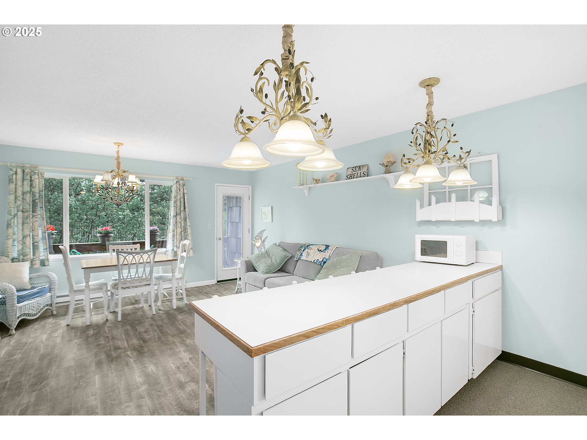 48988 Highway 101, Unit 137F Neskowin, OR 97149 - Photo 16 of 29 a very nice looking dining room with a large window