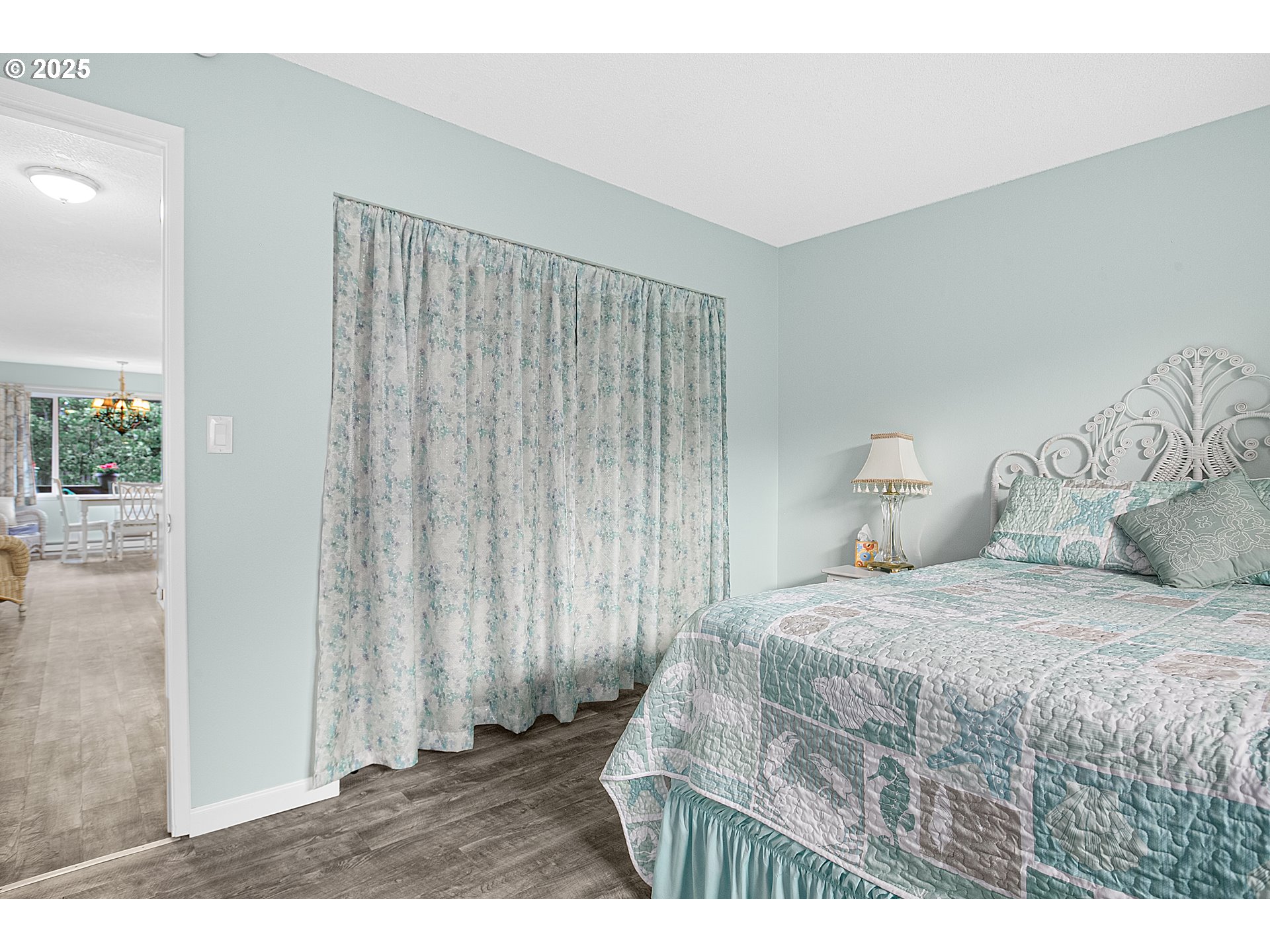 48988 Highway 101, Unit 137F Neskowin, OR 97149 - Photo 18 of 29 a bedroom with a bed and a window