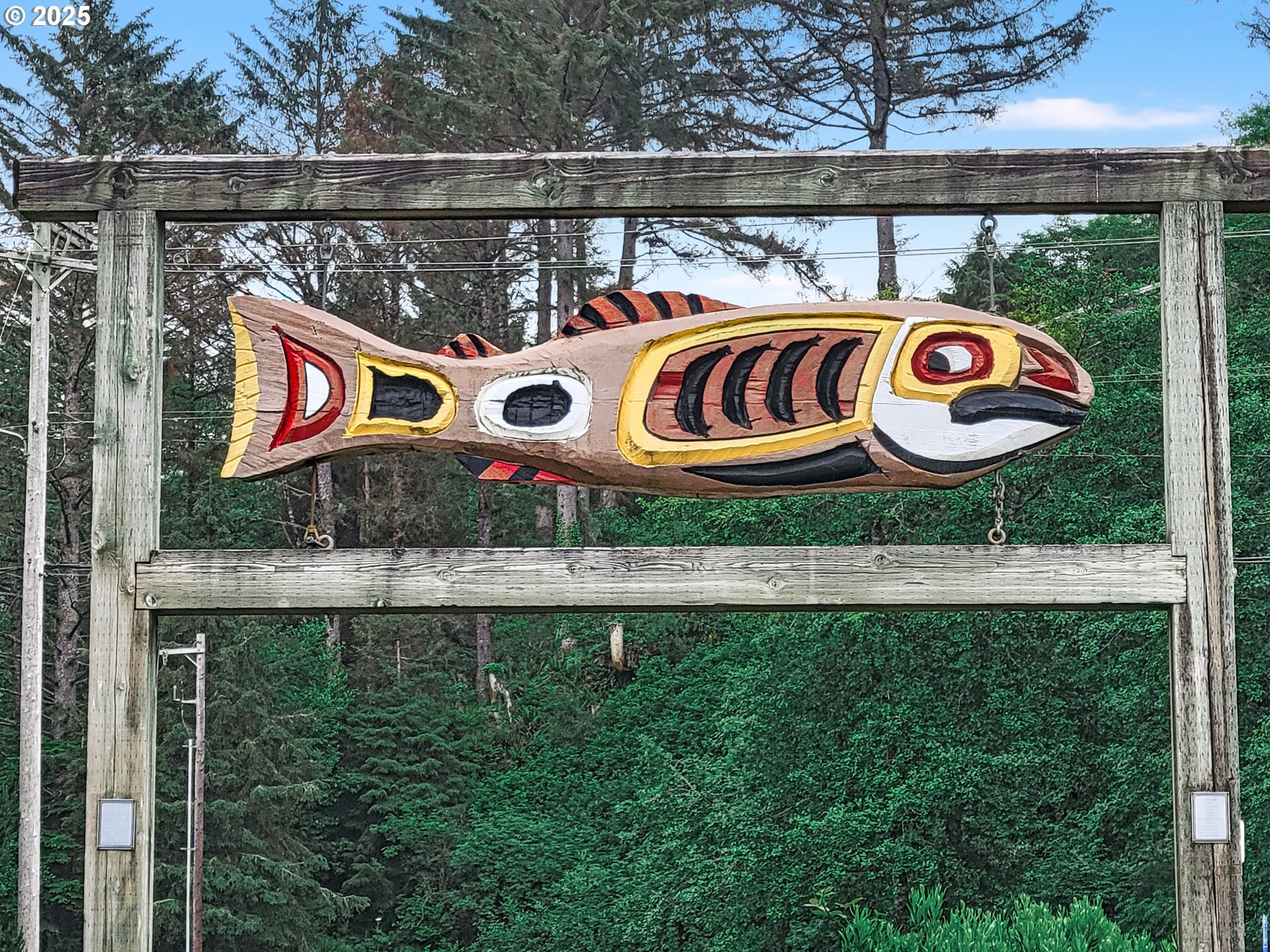 48988 Highway 101, Unit 137F Neskowin, OR 97149 - Photo 24 of 29 a sign that is on a pole