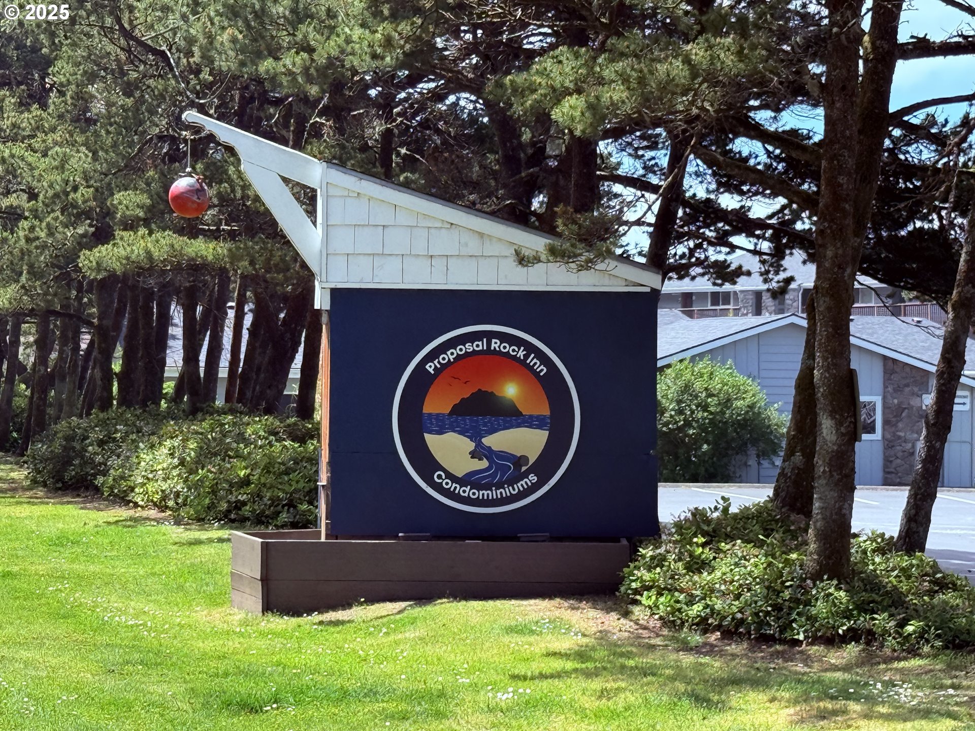 48988 Highway 101, Unit 137F Neskowin, OR 97149 - Photo 29 of 29 a front view of a house with garden