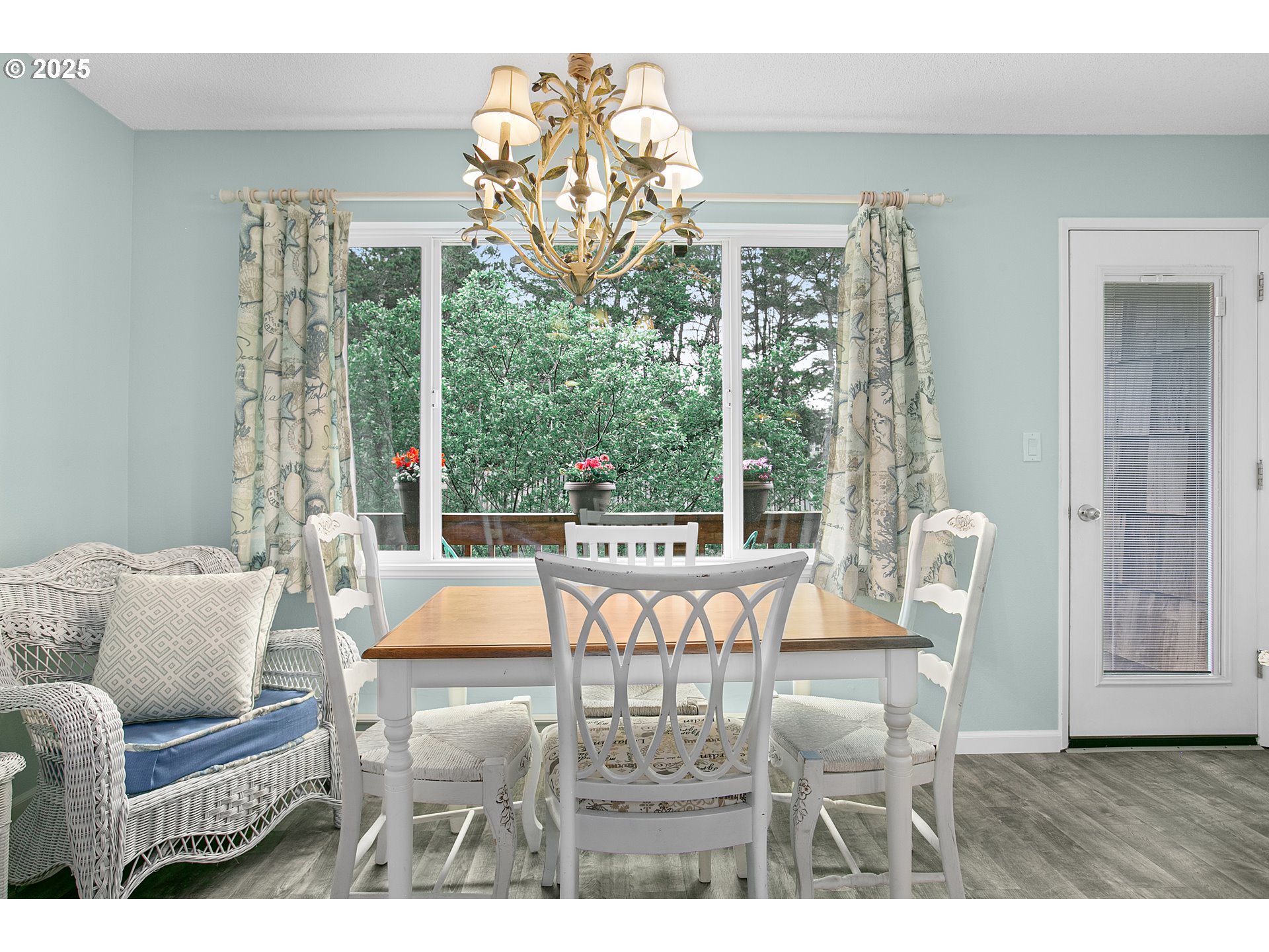 48988 Highway 101, Unit 137F Neskowin, OR 97149 - Photo 6 of 29 a outdoor living space with furniture and large windows