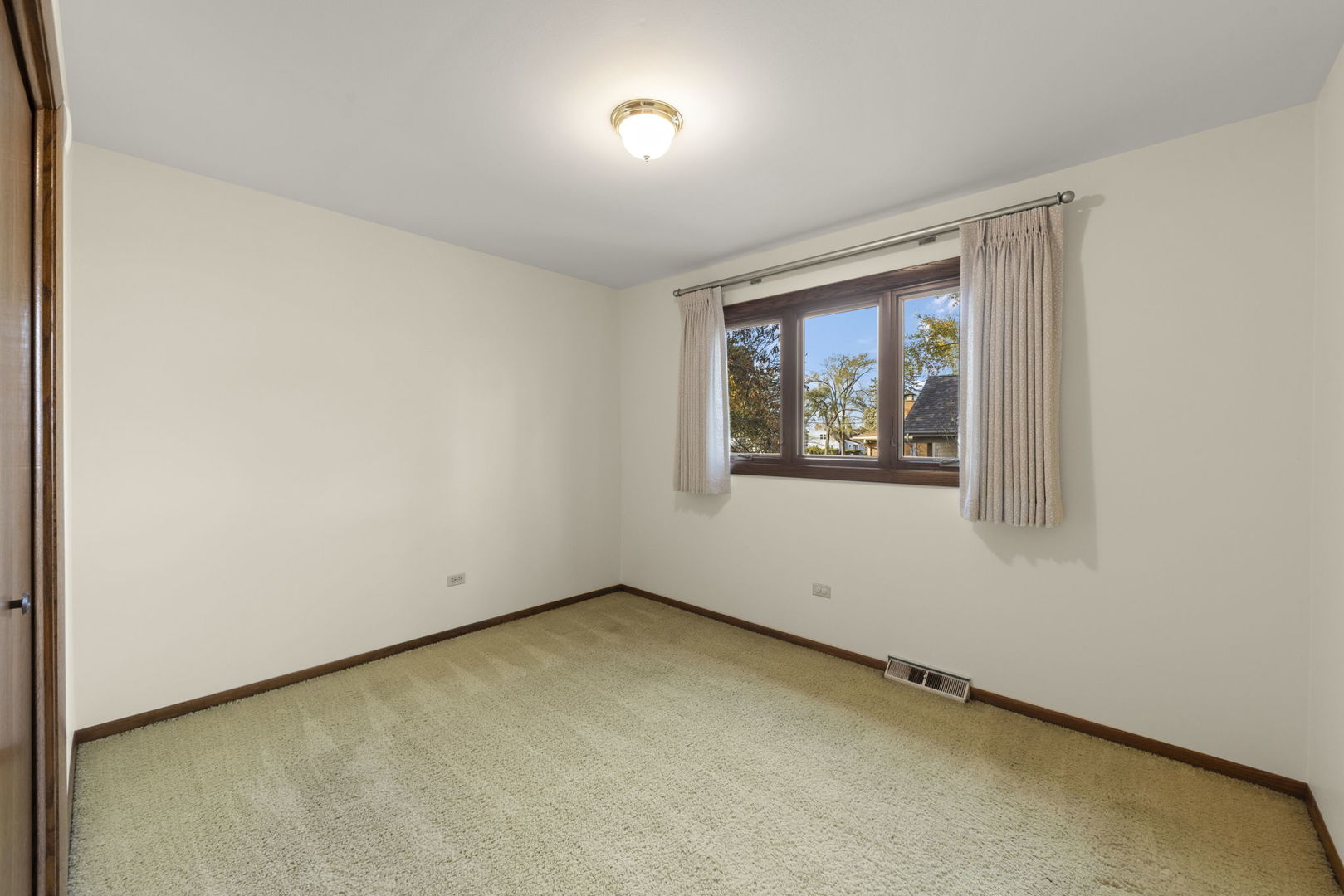 3068 Hickory Road Homewood, IL 60430 - Photo 18 of 44 an empty room with windows