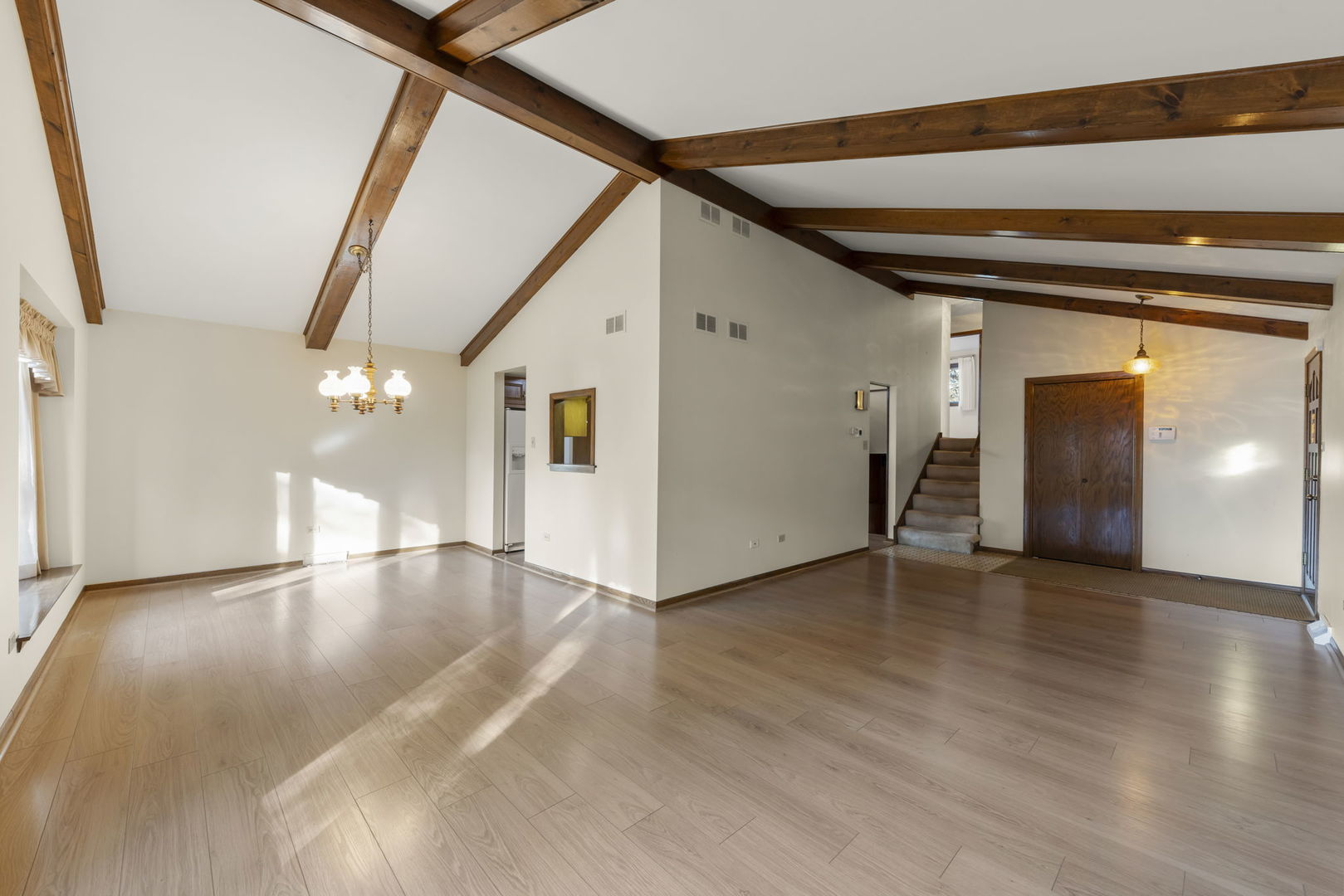 3068 Hickory Road Homewood, IL 60430 - Photo 5 of 44 a view of an empty room with wooden floor and a window