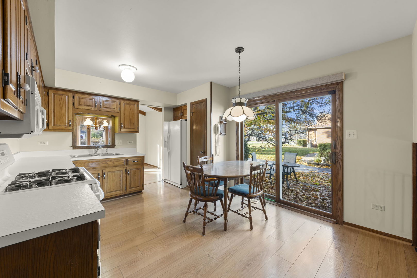 3068 Hickory Road Homewood, IL 60430 - Photo 7 of 44 a view of a dining room with furniture window and wooden floor