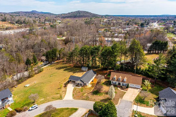 an aerial view of residential house with outdoor space