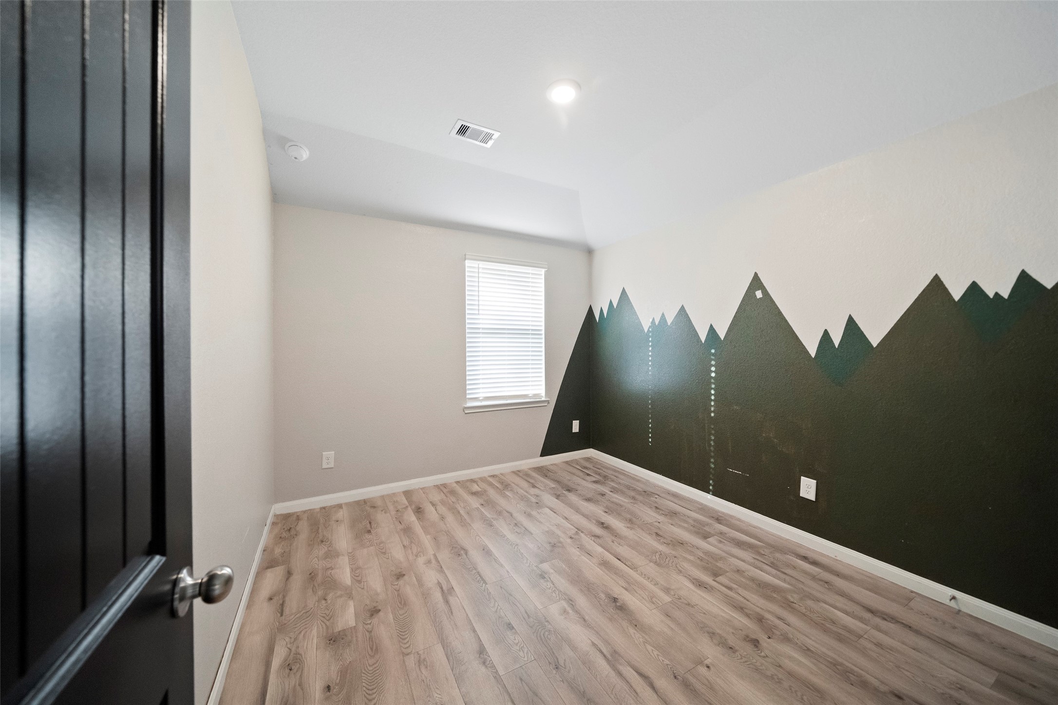 6161 White Oak Leaf Loop Conroe, TX 77303 - Photo 23 of 25 a view of a livingroom with a chandelier