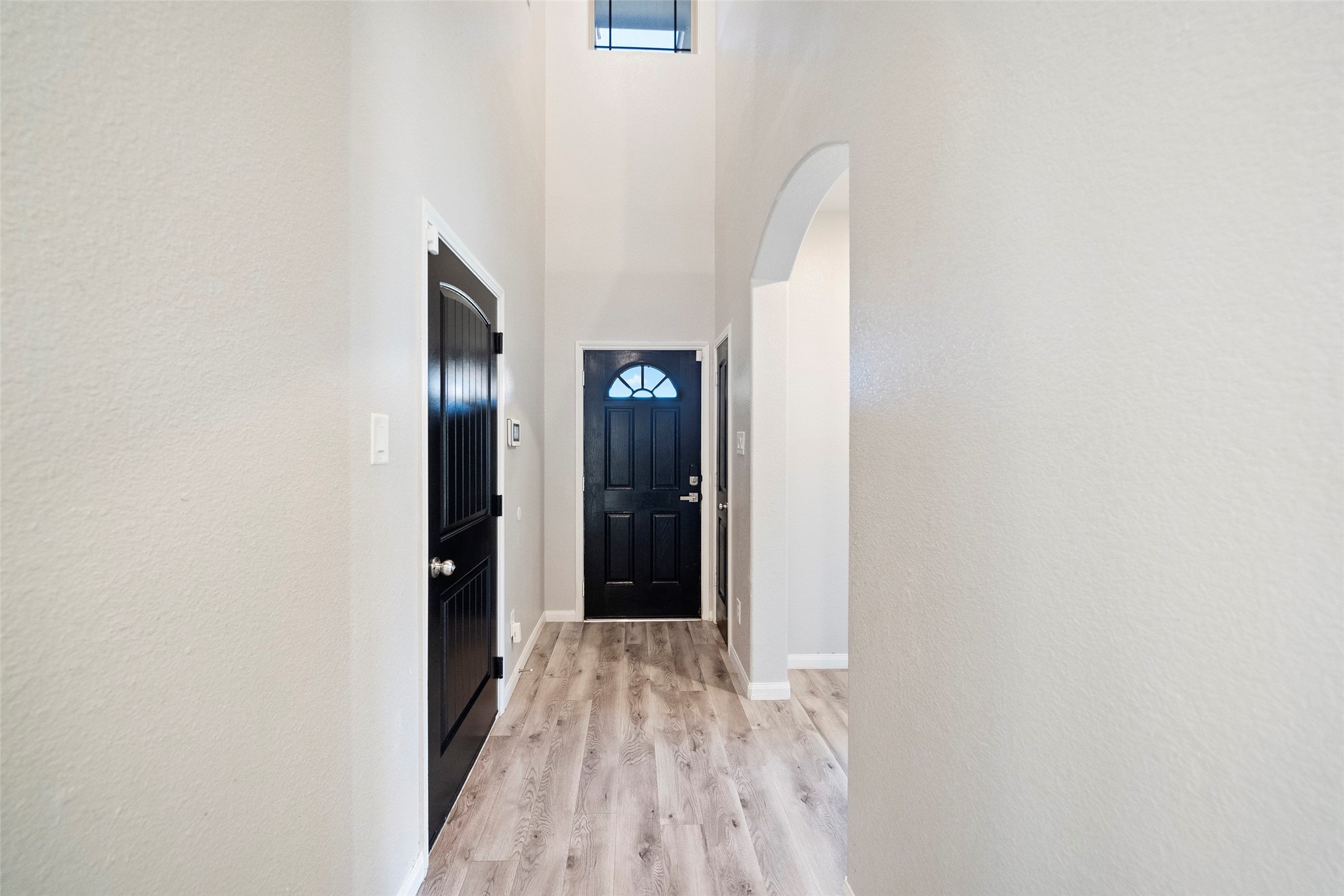 6161 White Oak Leaf Loop Conroe, TX 77303 - Photo 5 of 25 a view of a room with wooden floor