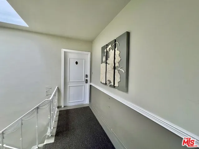 a view of hallway with stairs