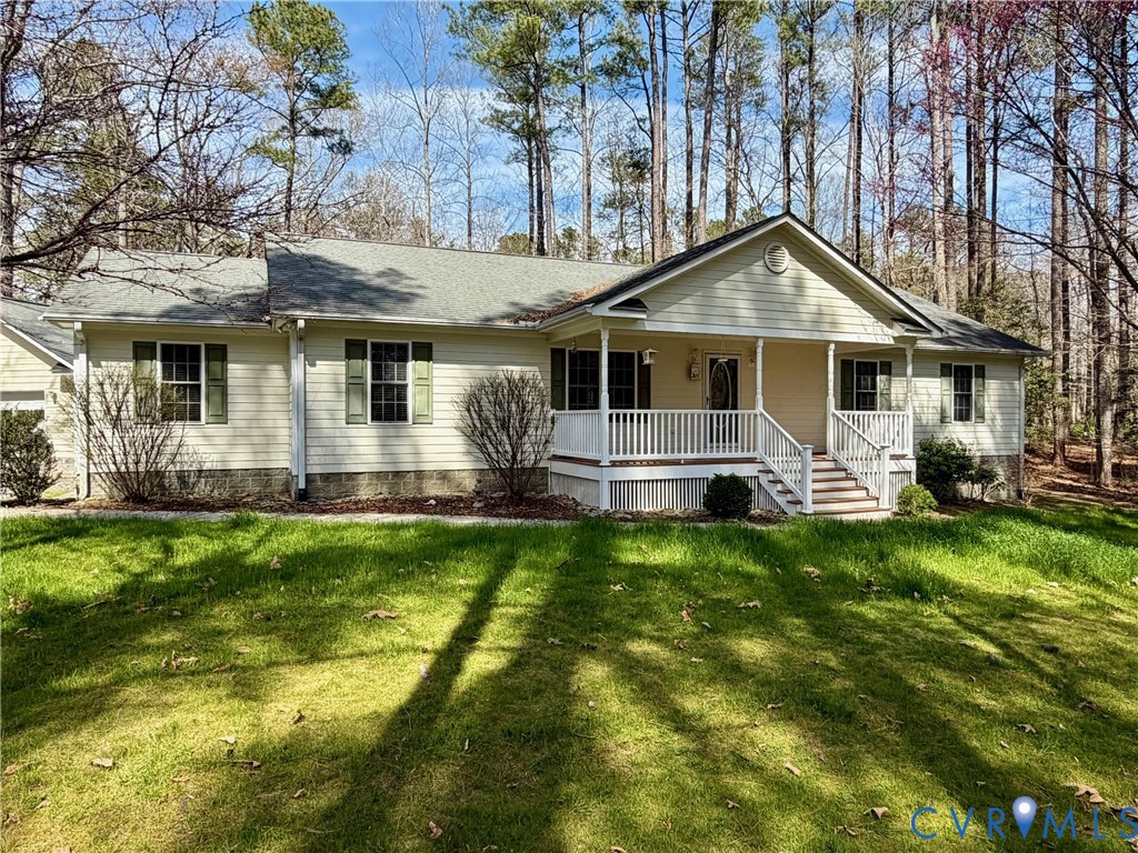 43 Ruddy Duck Road Heathsville, VA 22473 - Photo 2 of 46 a front view of house with yard and green space