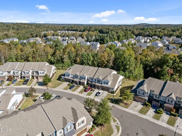 an aerial view of a house with a garden