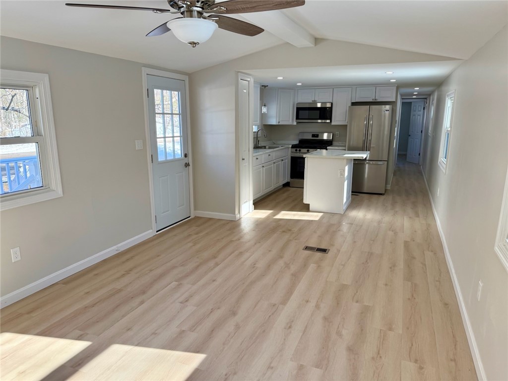 18 Airport Road Coventry, RI 02816 - Photo 12 of 22 Family Room/ Kitchen.