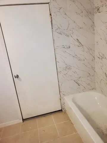 a bathroom with a bathtub