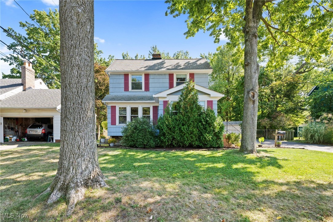 Colonial house with a front lawn
