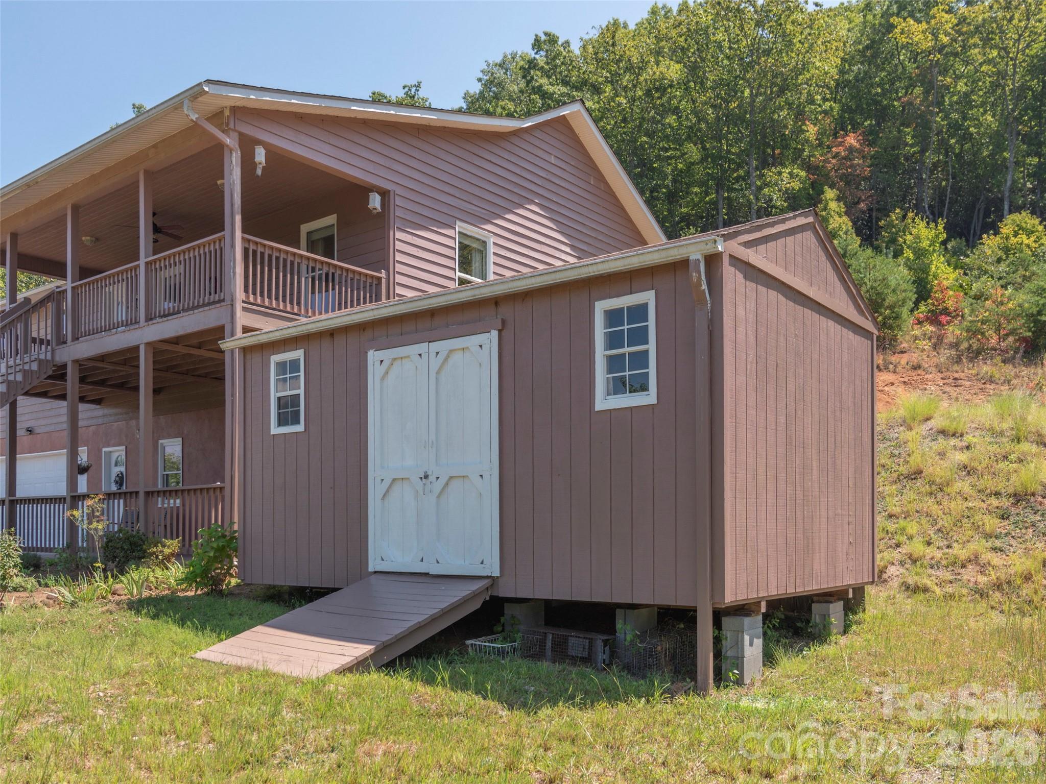 1120 Jacobs Branch Road Franklin, NC 28734 - Photo 33 of 36 a view of a small house with yard