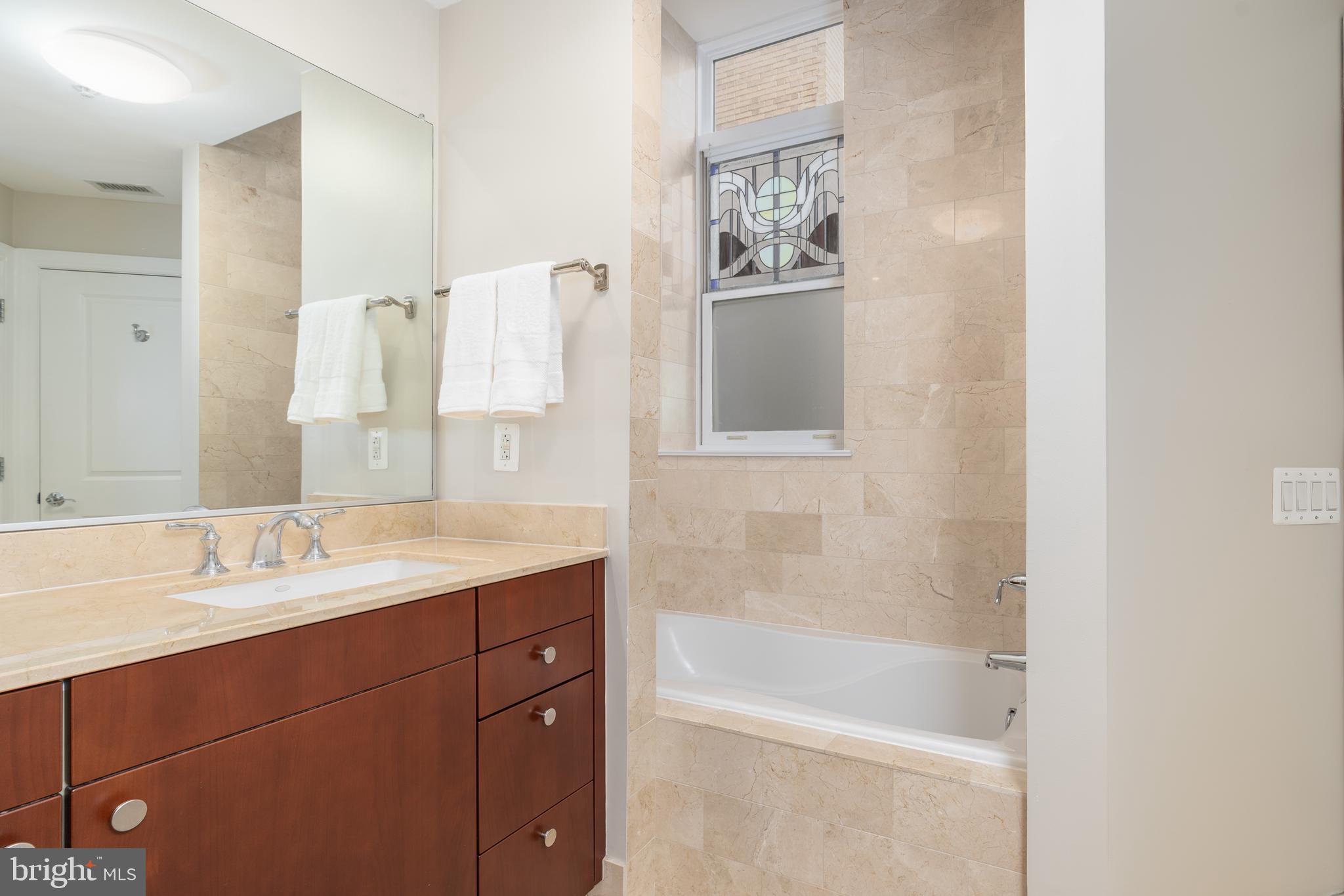 2425 L Street Northwest, Unit 314 Washington, DC 20037 - Photo 22 of 35 Primary Bath