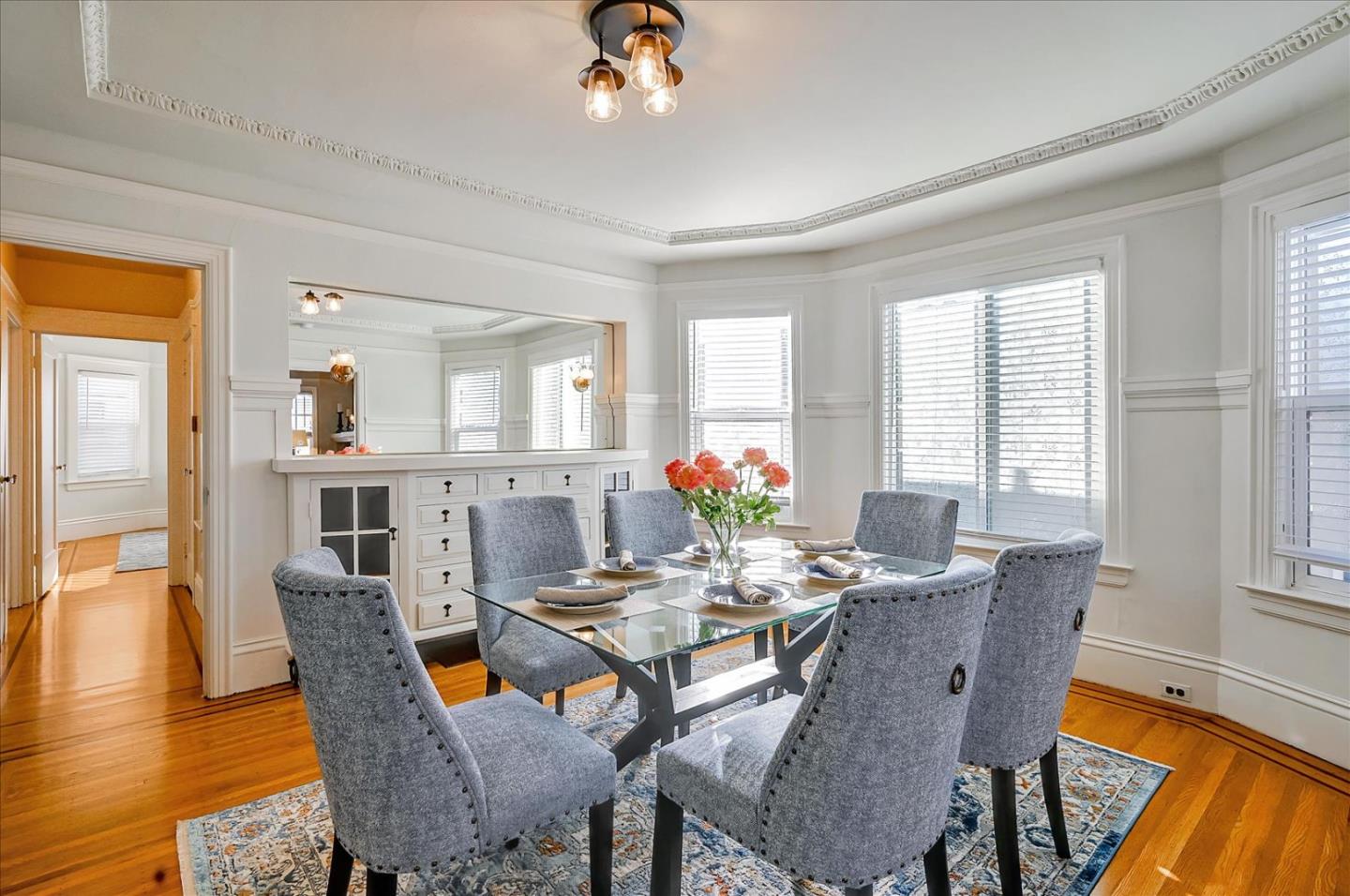 111 Genebern Way San Francisco, CA 94112 - Photo 12 of 37 a view of a dining room with furniture window and wooden floor