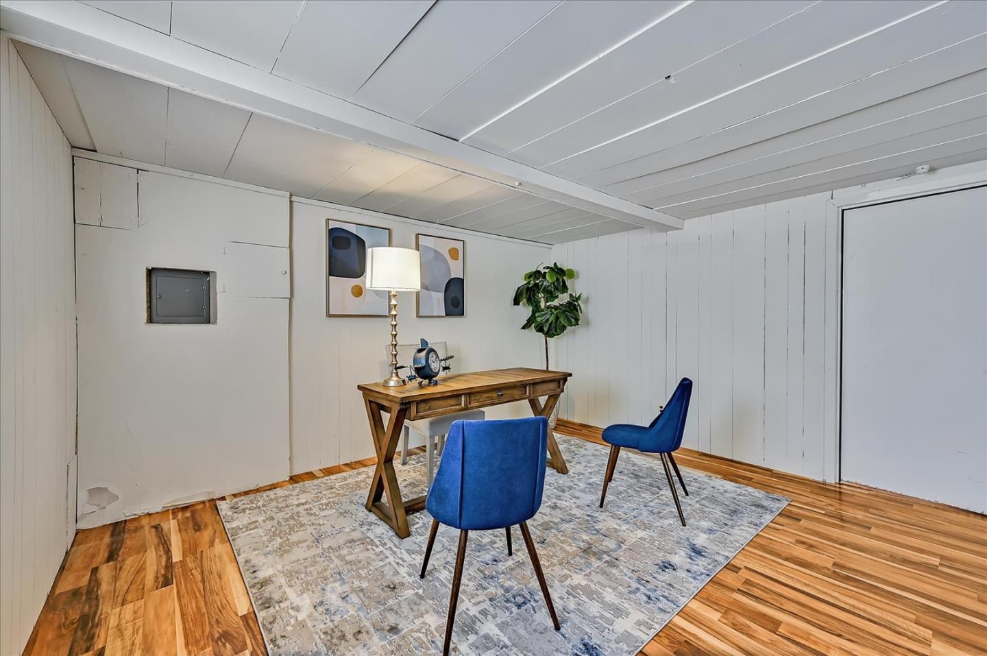 111 Genebern Way San Francisco, CA 94112 - Photo 21 of 37 a living room with a rug and wooden floor